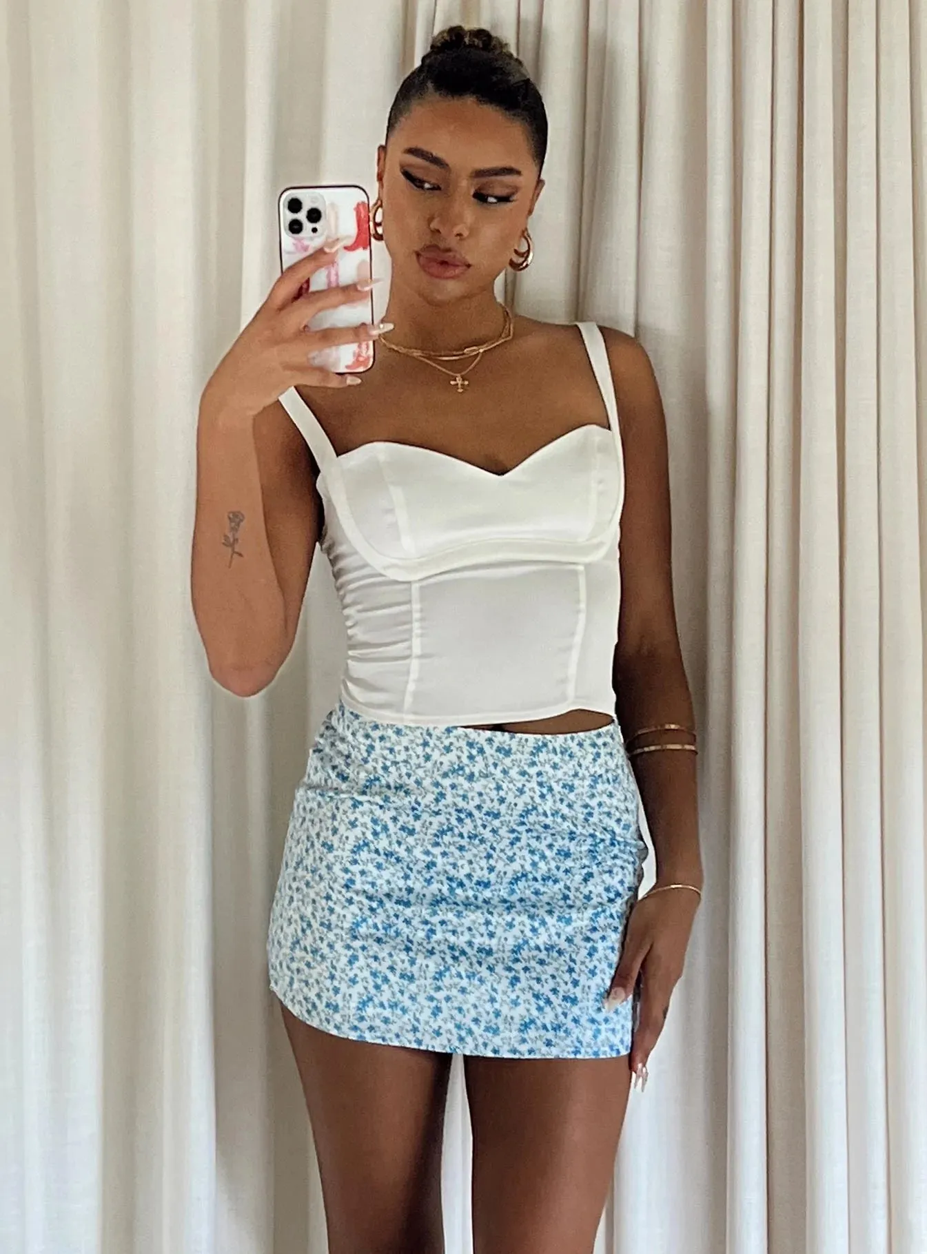 Blue Floral Mini Skirt by Celena