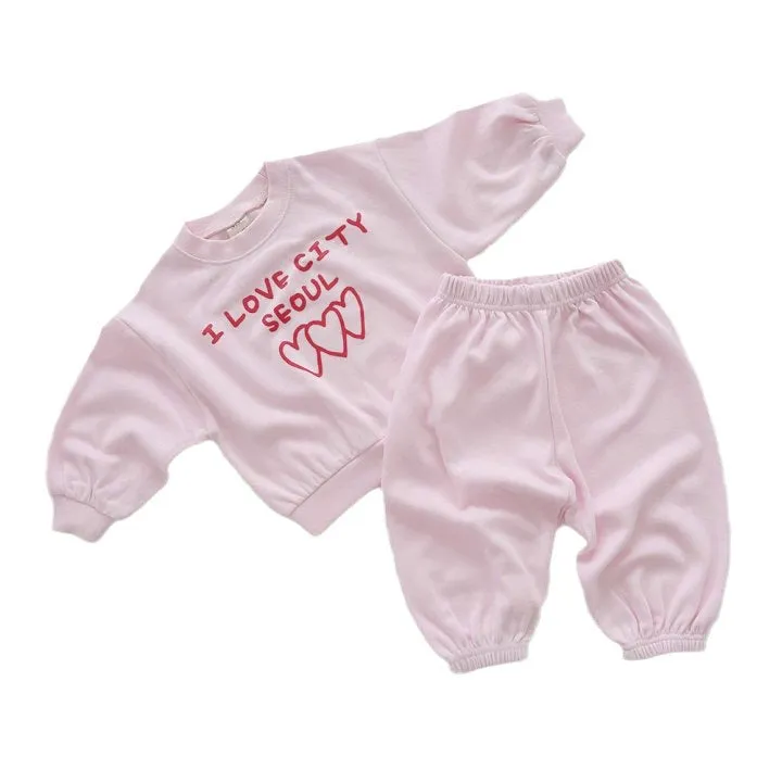 Wholesale Baby Girls and Boys 2-Piece Sets: Love Heart Tops and Solid Color Pants