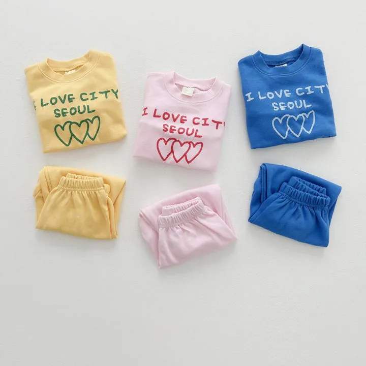 Wholesale Baby Girls and Boys 2-Piece Sets: Love Heart Tops and Solid Color Pants