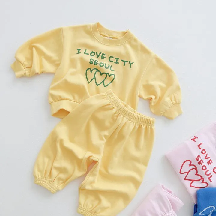 Wholesale Baby Girls and Boys 2-Piece Sets: Love Heart Tops and Solid Color Pants